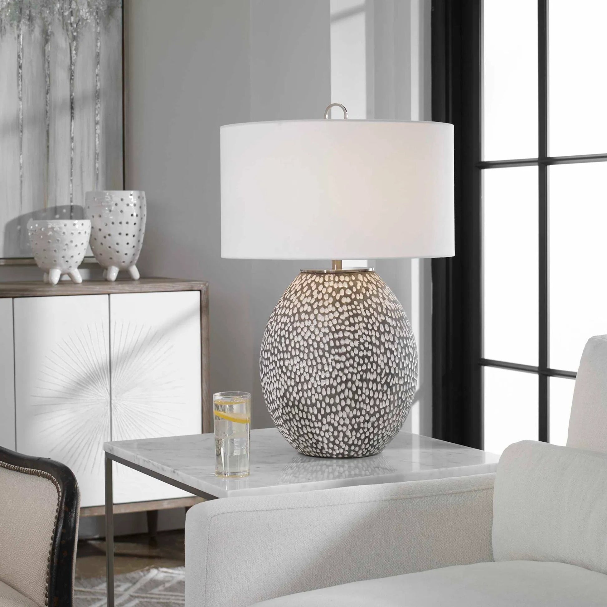 Cyprien Table Lamp by Uttermost in gray. Made from iron, ceramic, fabric in a modern style.