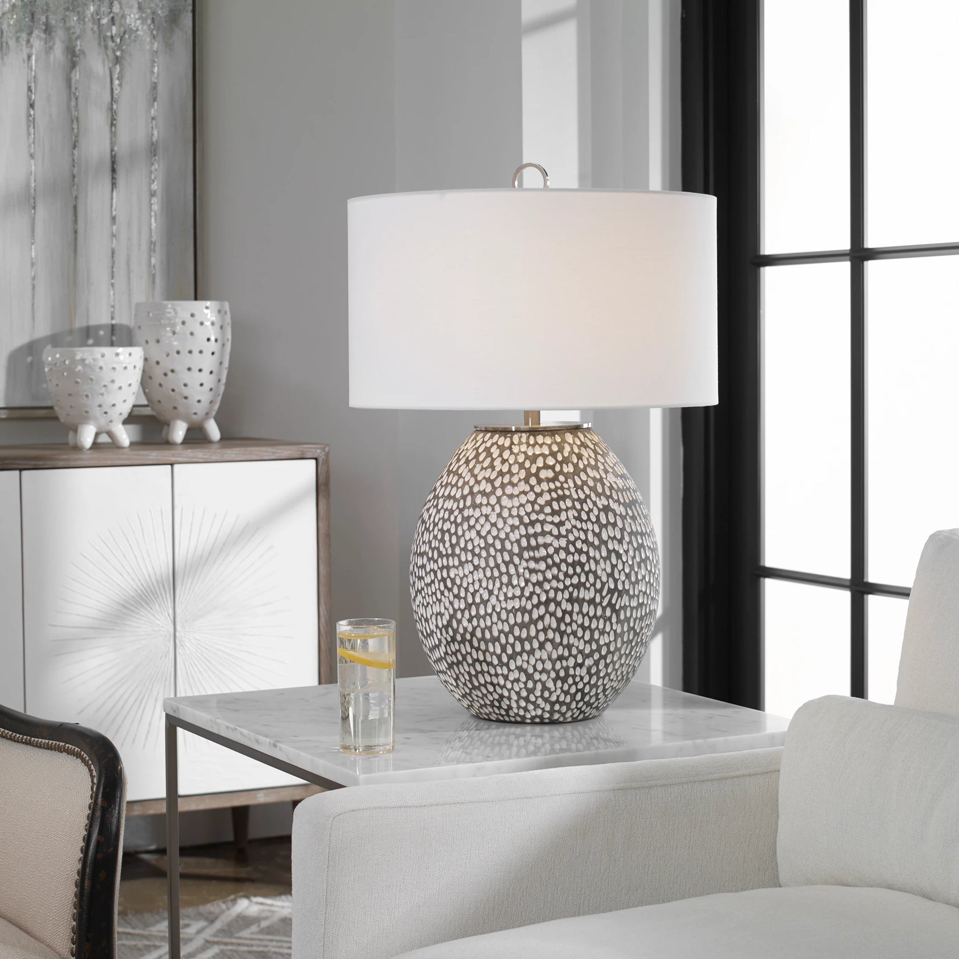Cyprien Table Lamp by Uttermost in gray. Made from iron, ceramic, fabric in a modern style.