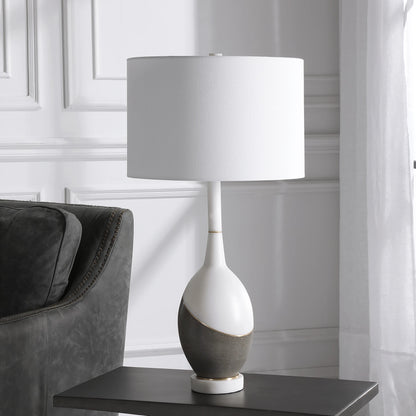 Tanali Table Lamp by Uttermost. Made from copper, concrete, resin, iron, fabric in a modern style.