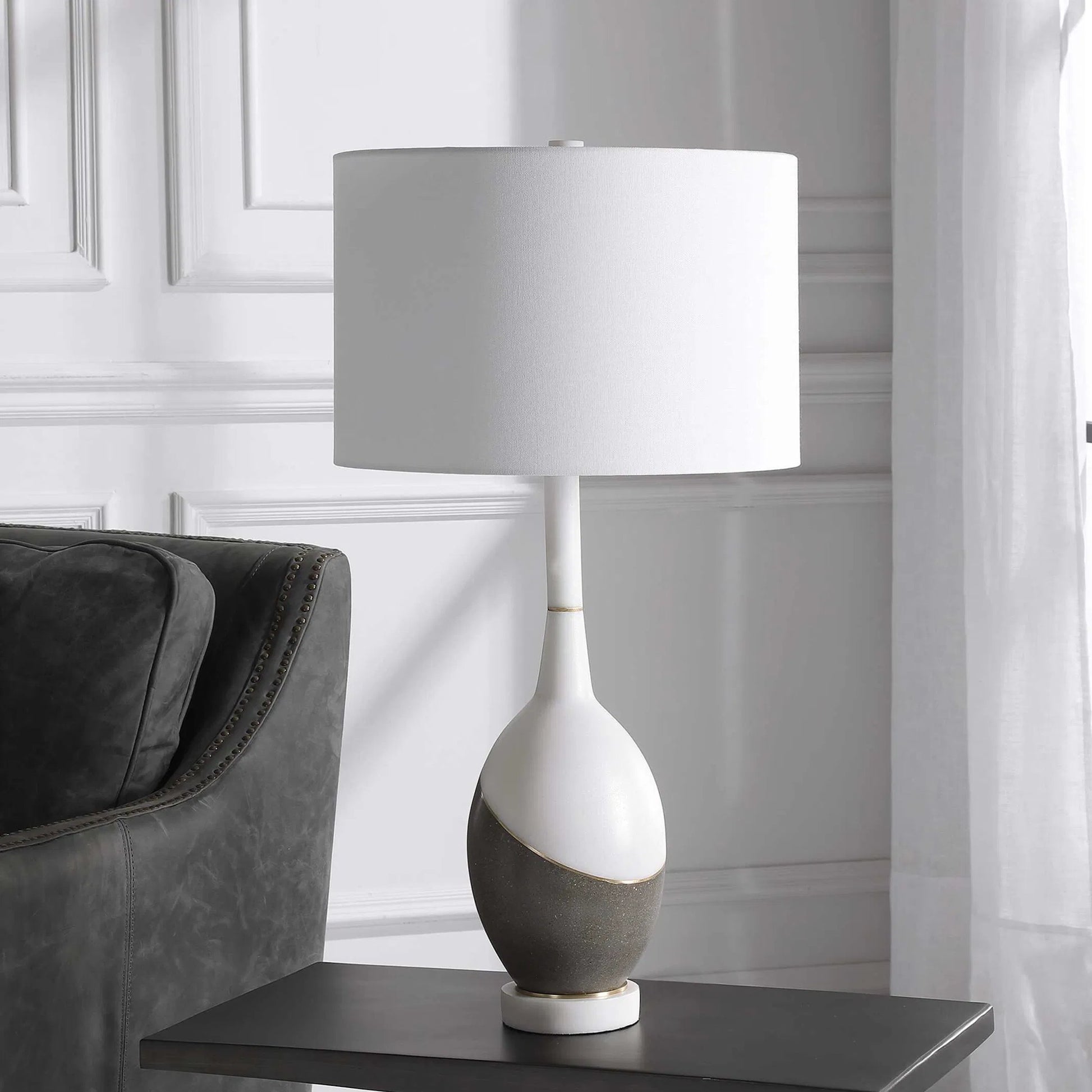 Tanali Table Lamp by Uttermost. Made from copper, concrete, resin, iron, fabric in a modern style.