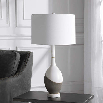 Tanali Table Lamp by Uttermost. Made from copper, concrete, resin, iron, fabric in a modern style.