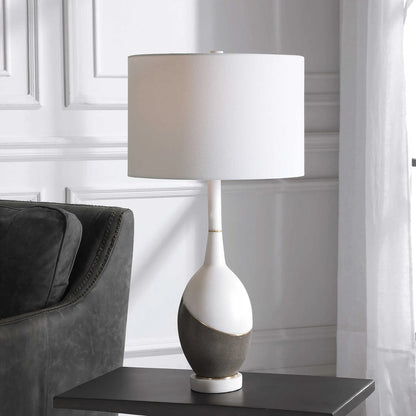 Tanali Table Lamp by Uttermost. Made from copper, concrete, resin, iron, fabric in a modern style.