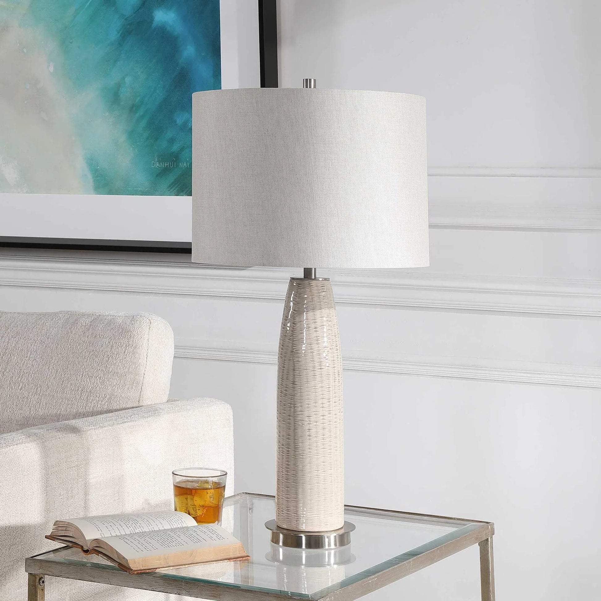 Delgado Table Lamp by Uttermost in gray. Made from ceramic, iron in a modern style.
