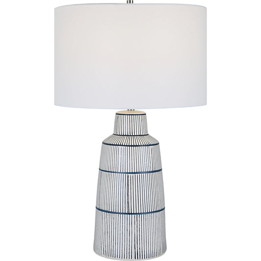 Breton Table Lamp by Uttermost in navy blue. Made from steel, ceramic, fabric in a coastal style.