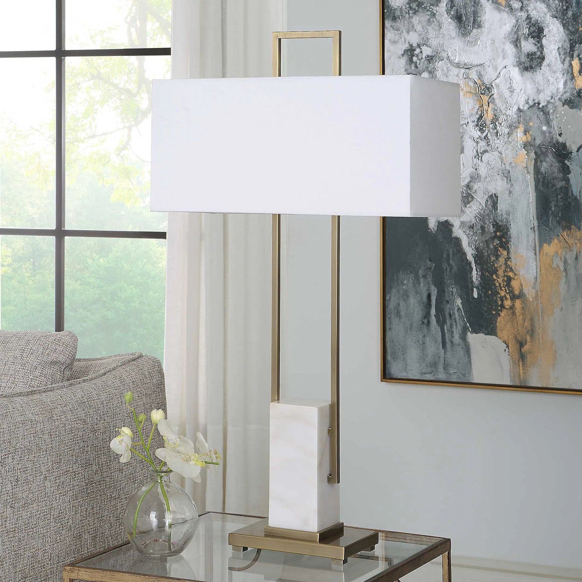 Column Table Lamp by Uttermost in brass. Made from steel, marble in a modern style.