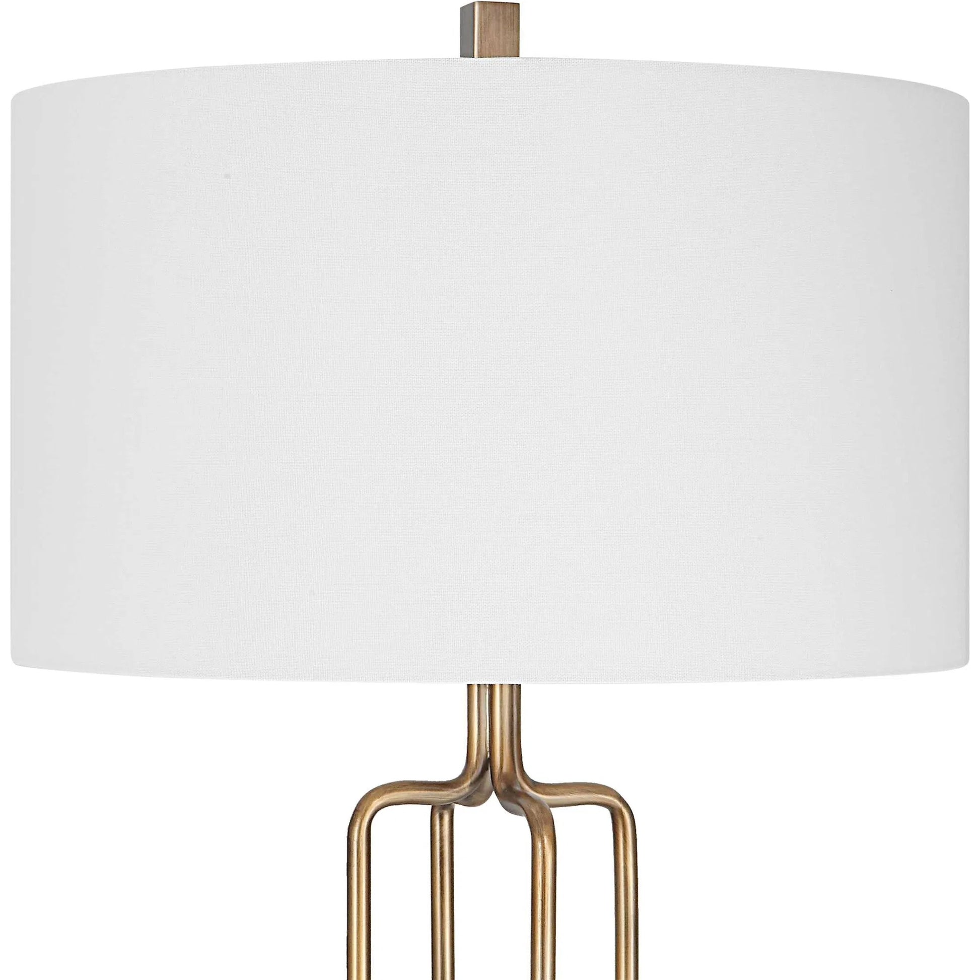 Link Floor Lamp by Uttermost in antique gold. Made from iron, fabric in a modern style.