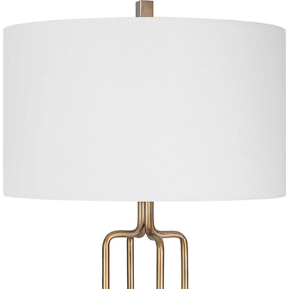 Link Floor Lamp by Uttermost in antique gold. Made from iron, fabric in a modern style.