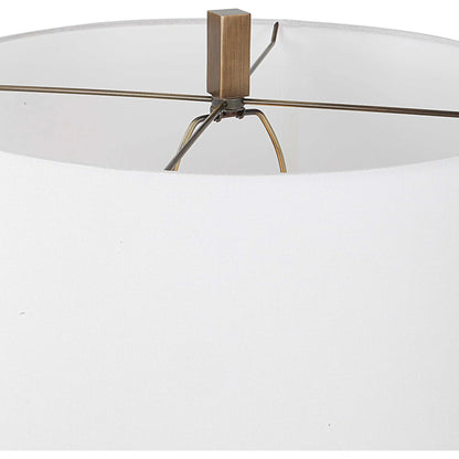 Link Floor Lamp by Uttermost in antique gold. Made from iron, fabric in a modern style.