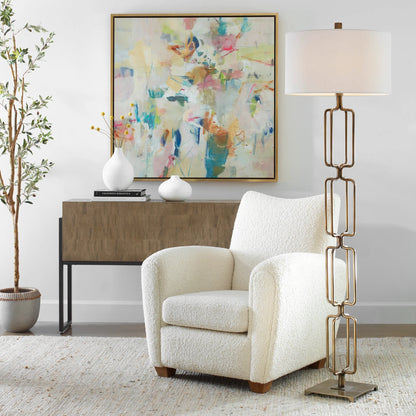 Link Floor Lamp by Uttermost in antique gold. Made from iron, fabric in a modern style.