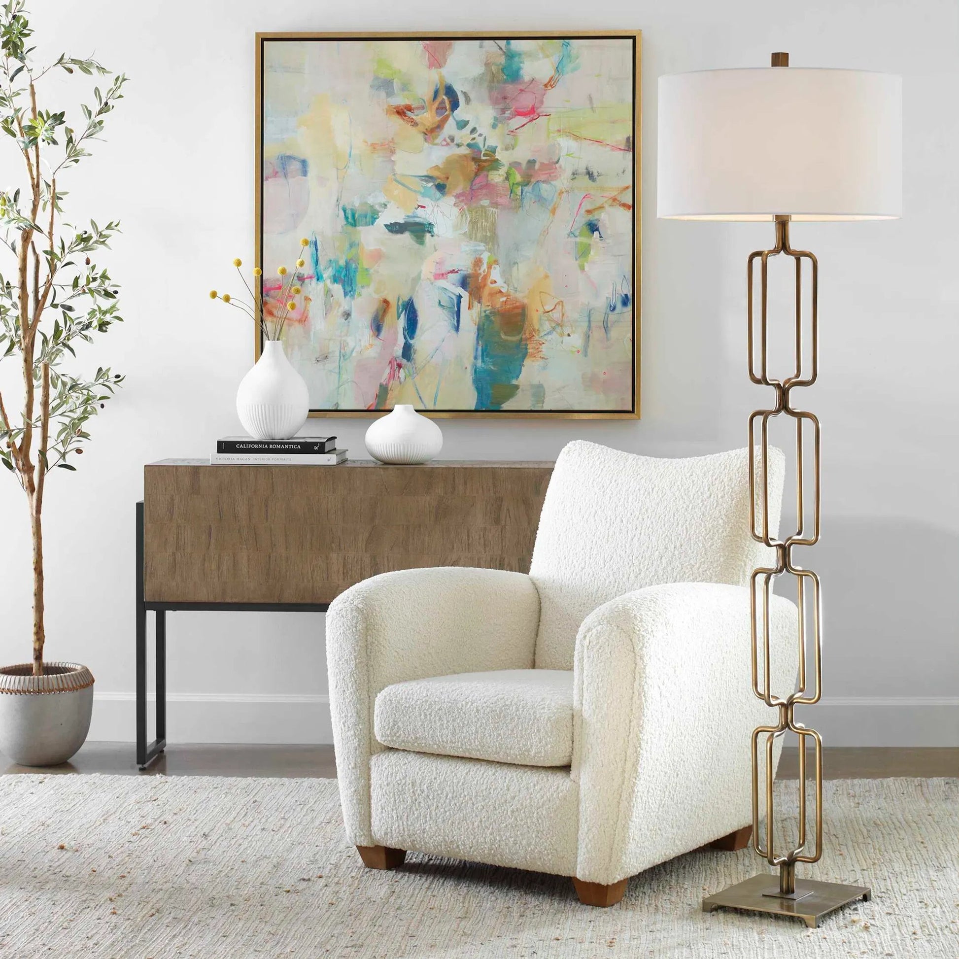Link Floor Lamp by Uttermost in antique gold. Made from iron, fabric in a modern style.