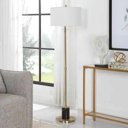 Guard Floor Lamp by Uttermost in brass. Made from iron, marble, fabric in a modern style.