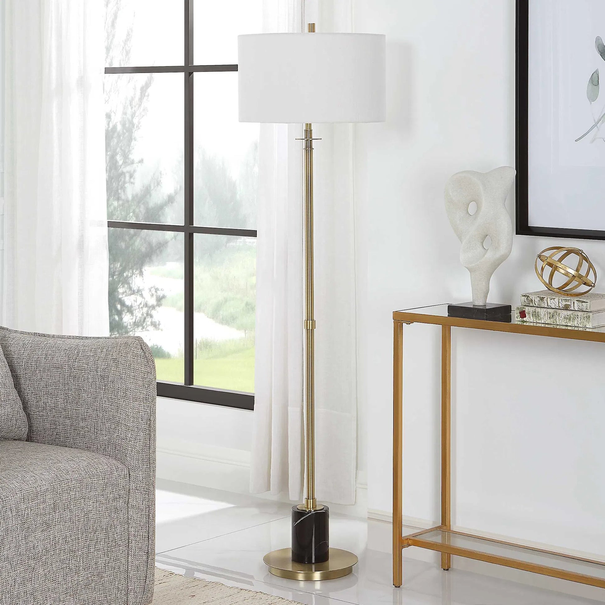 Guard Floor Lamp by Uttermost in brass. Made from iron, marble, fabric in a modern style.
