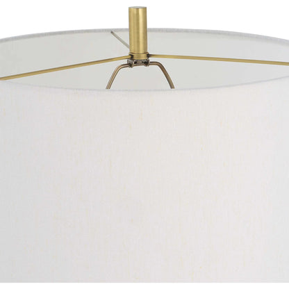 Guard Floor Lamp by Uttermost in brass. Made from iron, marble, fabric in a modern style.