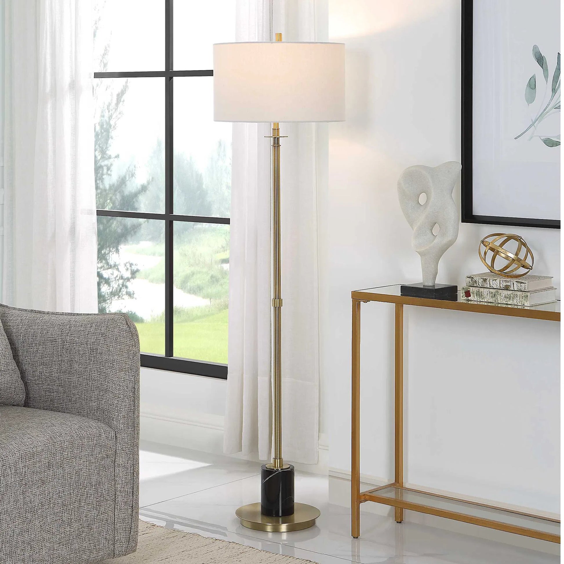 Guard Floor Lamp by Uttermost in brass. Made from iron, marble, fabric in a modern style.