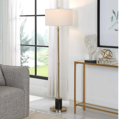 Guard Floor Lamp by Uttermost in brass. Made from iron, marble, fabric in a modern style.