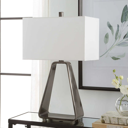 Halo Table Lamp by Uttermost in antique nickel. Made from steel, fabric in a modern style.