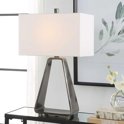 Halo Table Lamp by Uttermost in antique nickel. Made from steel, fabric in a modern style.