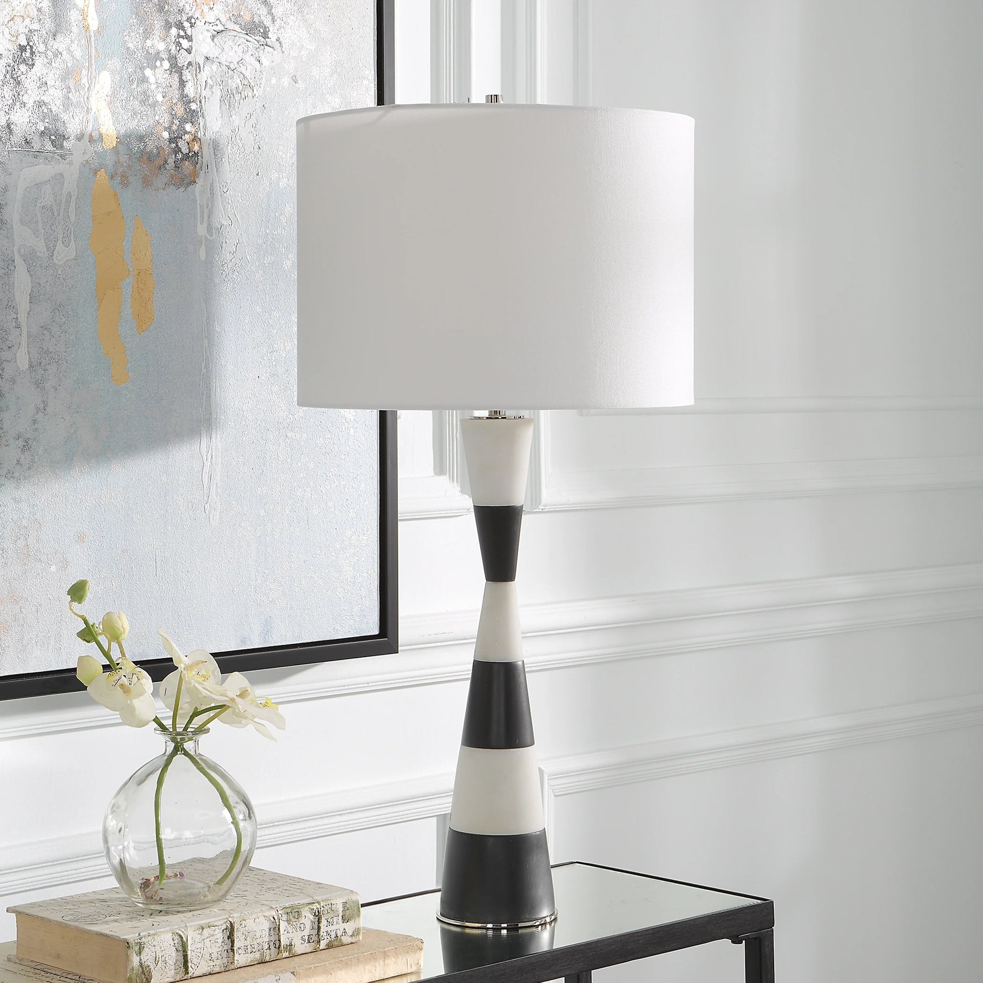 Bandeau Banded Table Lamp by Uttermost in black, white. Made from rice stone, iron, linen, resin in a modern style.