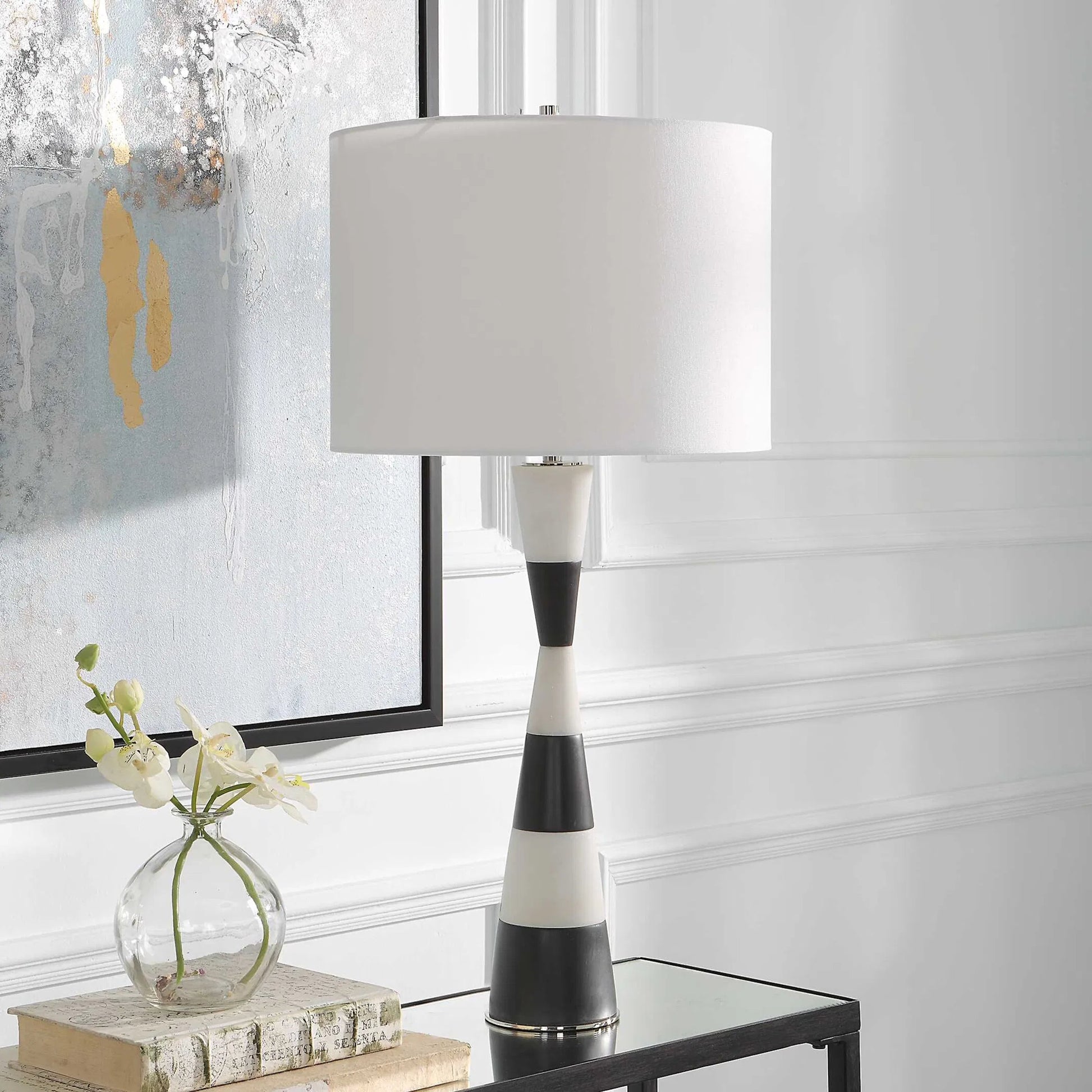 Bandeau Banded Table Lamp by Uttermost in black, white. Made from rice stone, iron, linen, resin in a modern style.