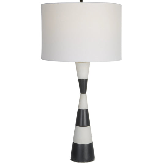 Bandeau Banded Table Lamp by Uttermost in black, white. Made from rice stone, iron, linen, resin in a modern style.