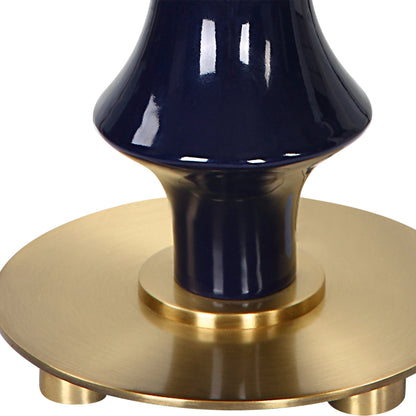 Coil Sculpted Table Lamp by Uttermost in cobalt. Made from ceramic, iron, fabric in a modern style.