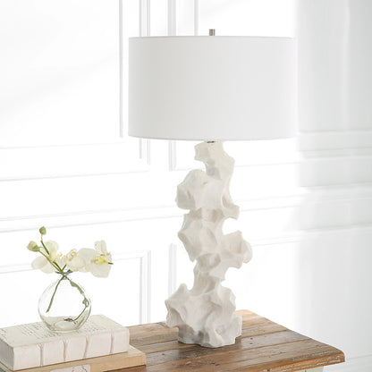 Remnant Table Lamp by Uttermost in white. Made from man-made stone, iron, fabric in a modern style.