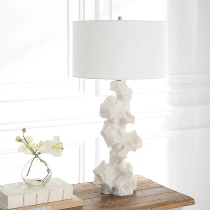 Remnant Table Lamp by Uttermost in white. Made from man-made stone, iron, fabric in a modern style.