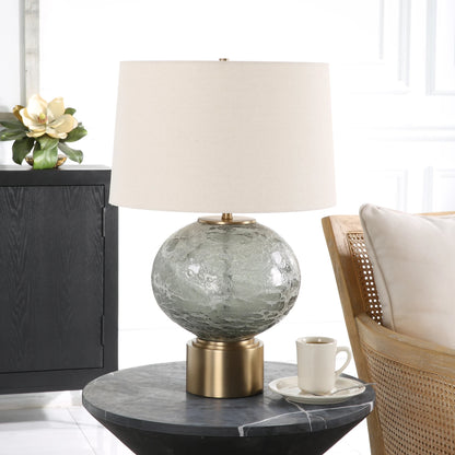 Lunia Table Lamp by Uttermost in smoky gray. Made from iron, glass, linen in a modern style.