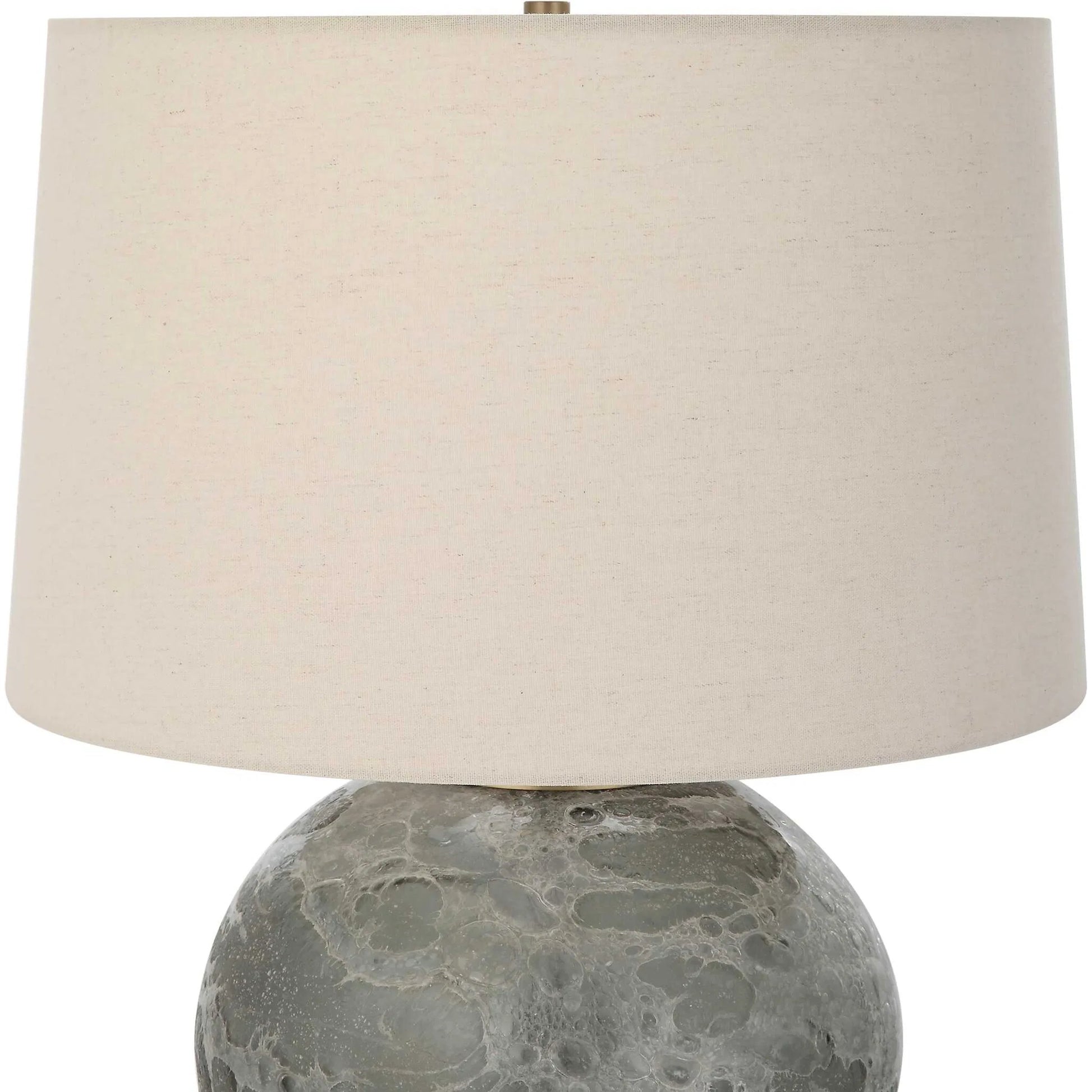 Lunia Table Lamp by Uttermost in smoky gray. Made from iron, glass, linen in a modern style.