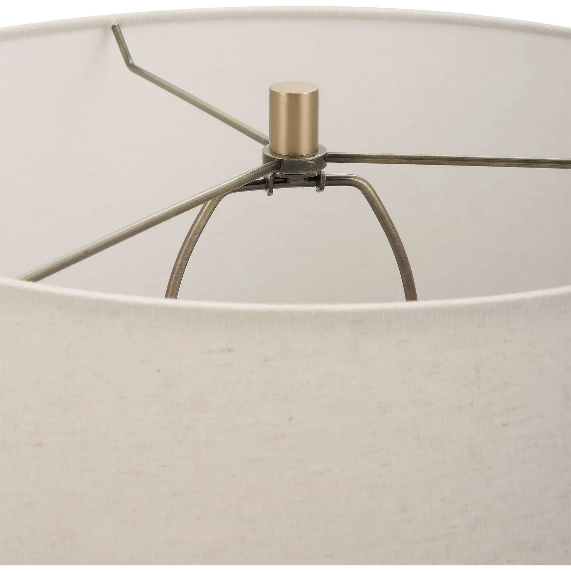 Lunia Table Lamp by Uttermost in smoky gray. Made from iron, glass, linen in a modern style.