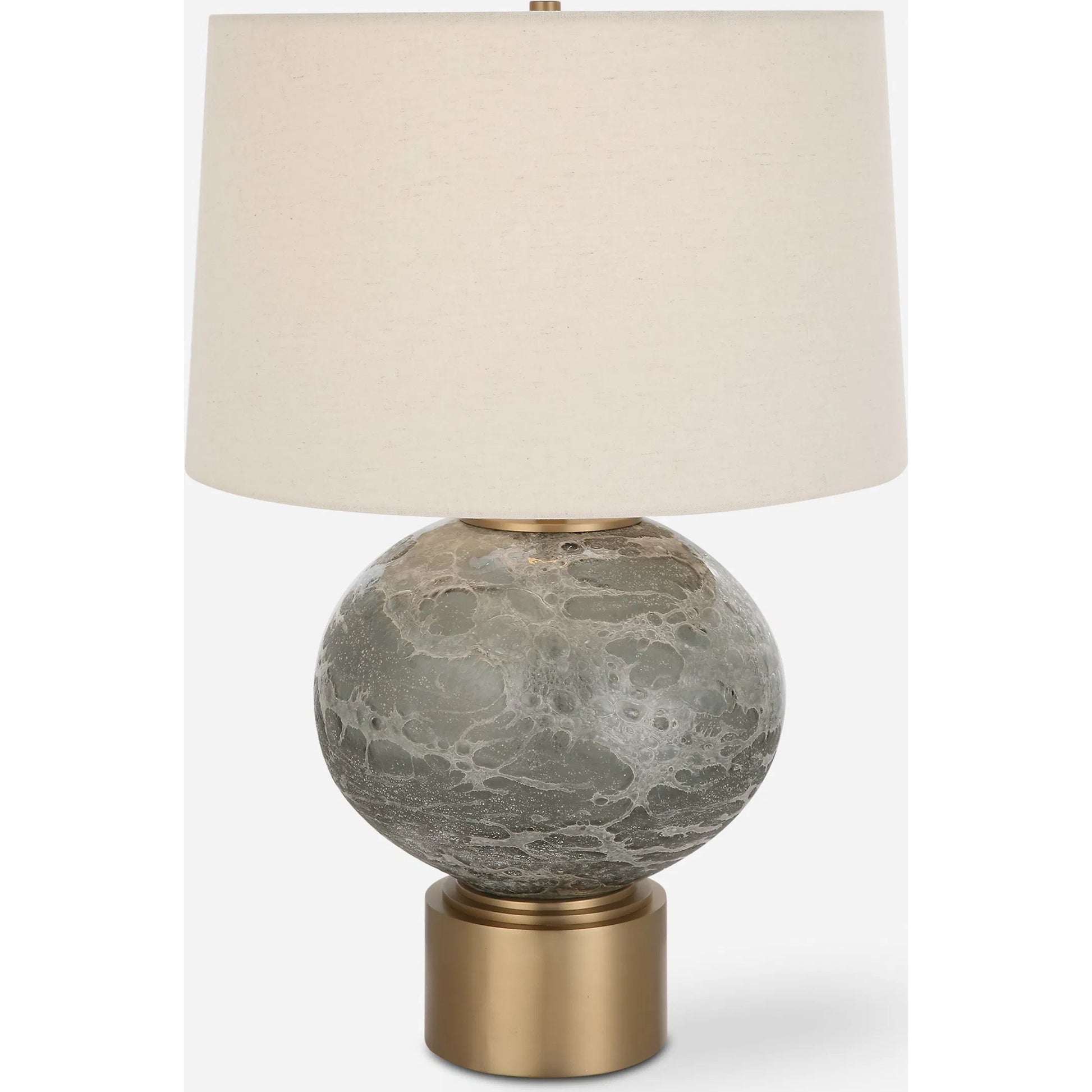 Lunia Table Lamp by Uttermost in smoky gray. Made from iron, glass, linen in a modern style.