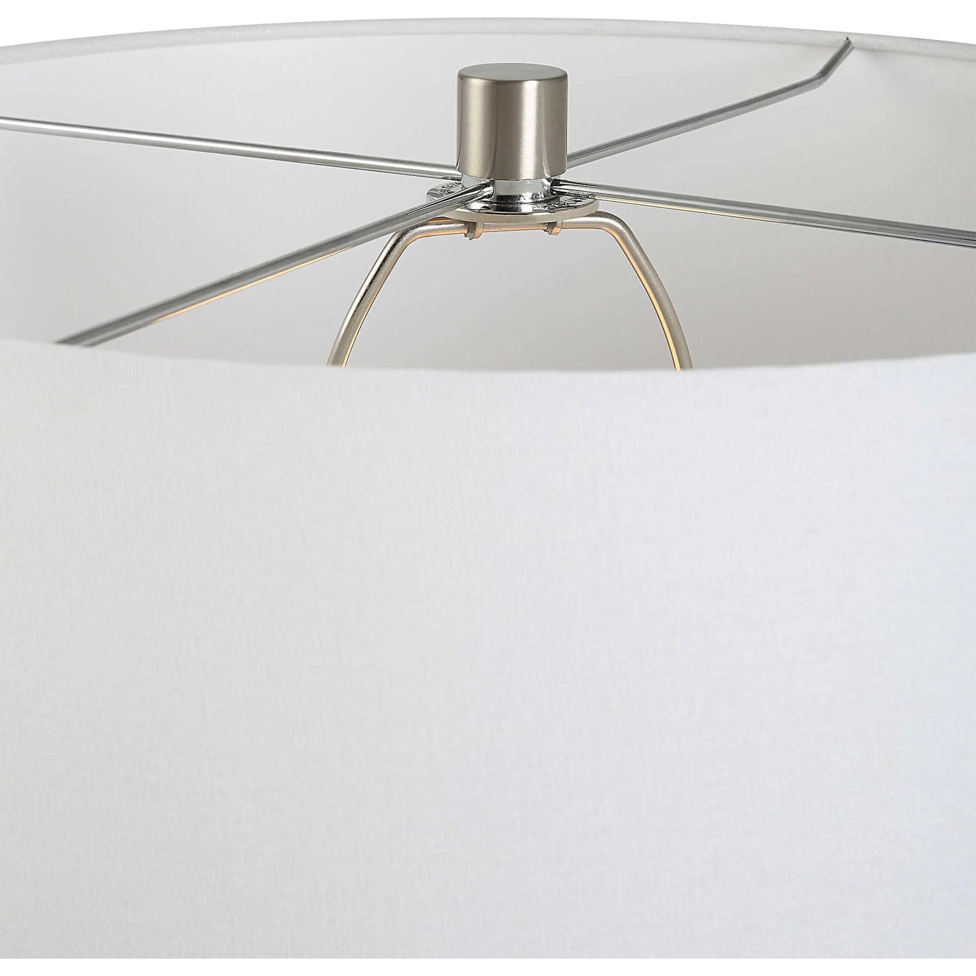 Teramo Table Lamp by Uttermost in blue and nickel. Made from ceramic, iron, fabric in a modern style.