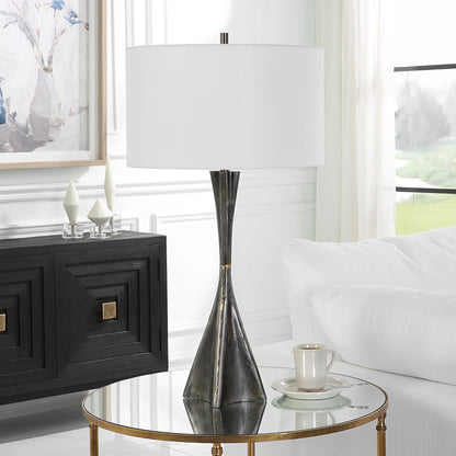 Keiron Table Lamp by Uttermost in brass. Made from steel, cast iron, fabric in a modern style.