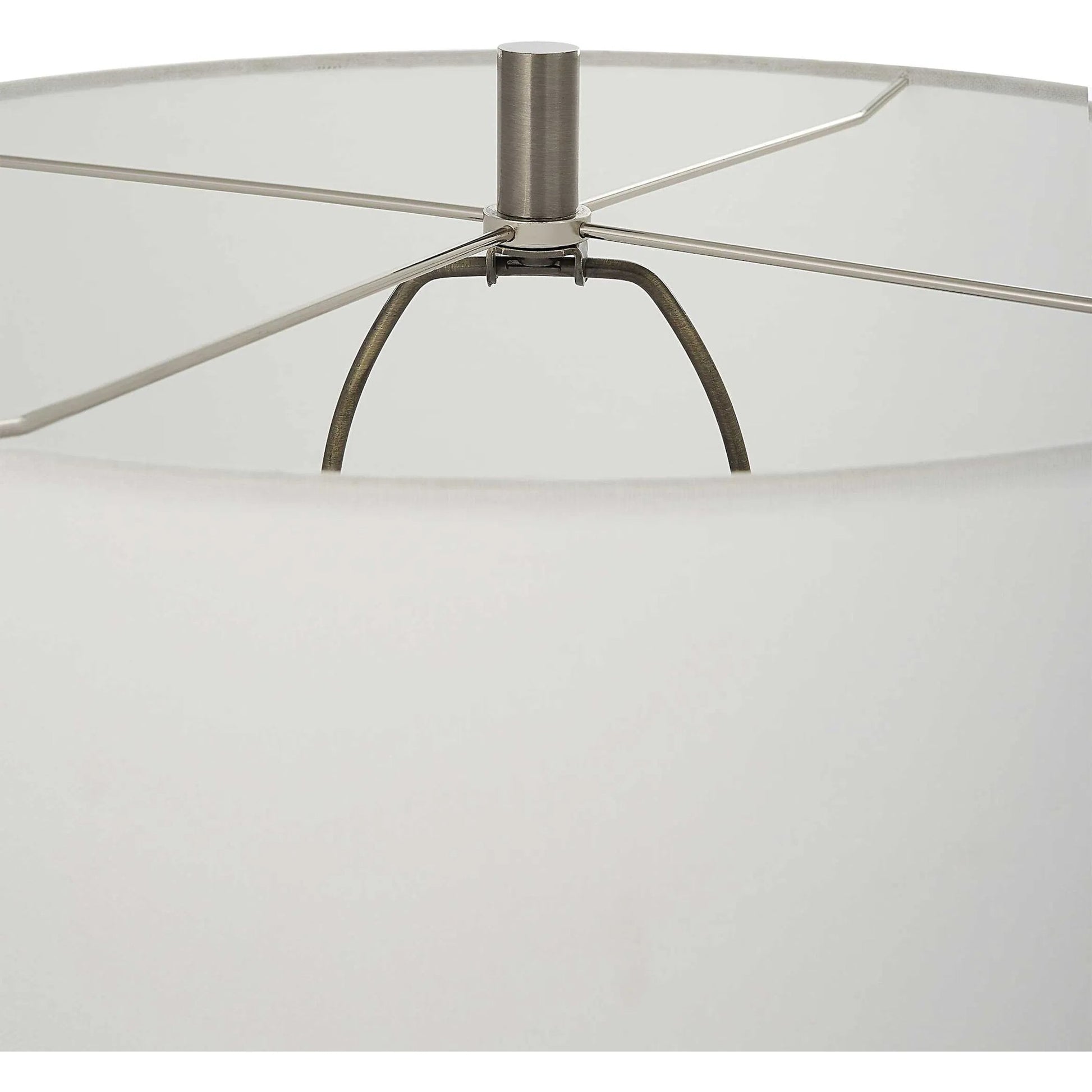 Keiron Table Lamp by Uttermost in brass. Made from steel, cast iron, fabric in a modern style.