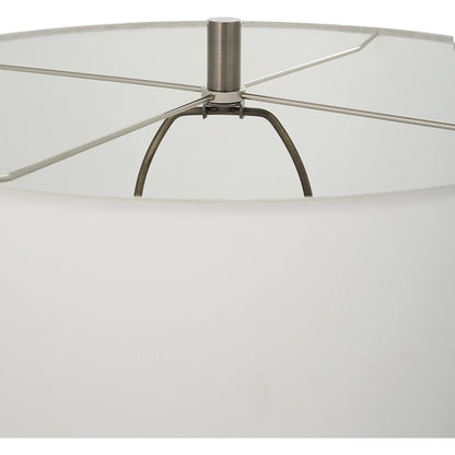Keiron Table Lamp by Uttermost in brass. Made from steel, cast iron, fabric in a modern style.