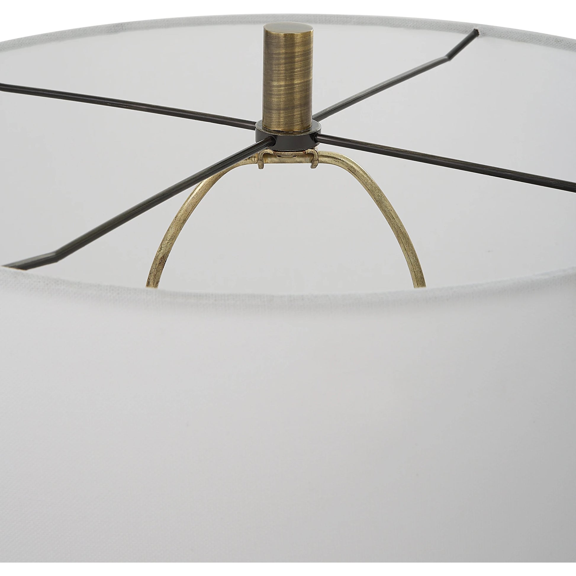 Annora Glossy Table Lamp by Uttermost in brass. Made from steel, resin, fabric in a modern style.