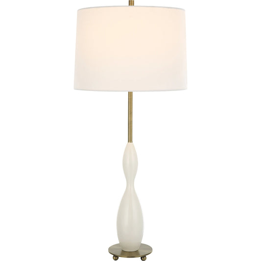 Annora Glossy Table Lamp by Uttermost in brass. Made from steel, resin, fabric in a modern style.