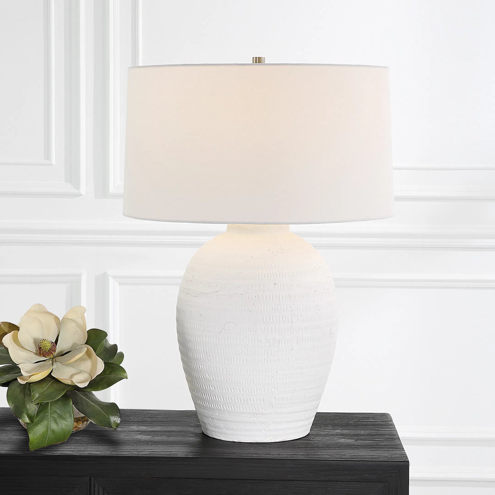 Reyna Table Lamp by Uttermost in chalk white, nickel. Made from steel, ceramic, fabric in a modern style.