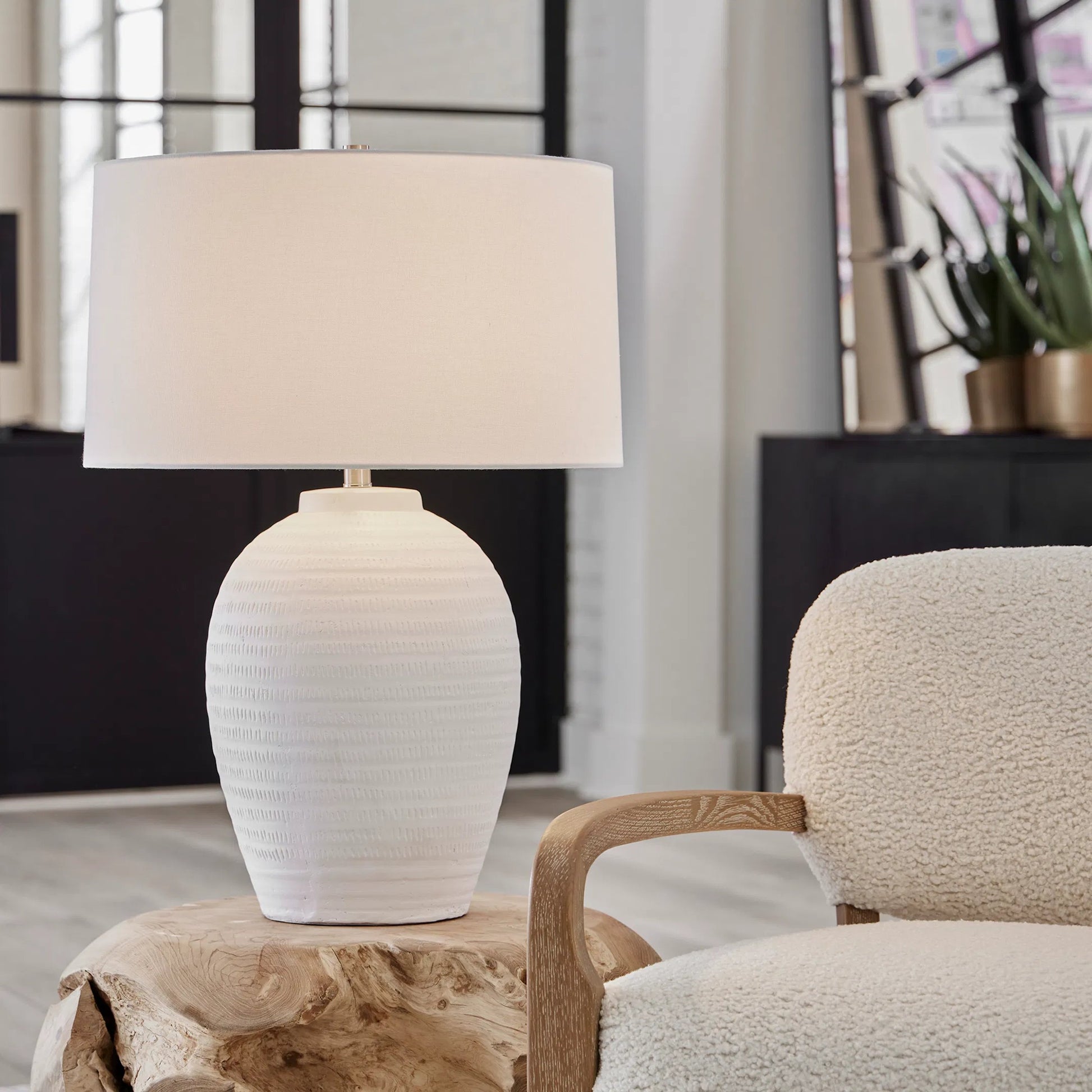 Reyna Table Lamp by Uttermost in chalk white, nickel. Made from steel, ceramic, fabric in a modern style.