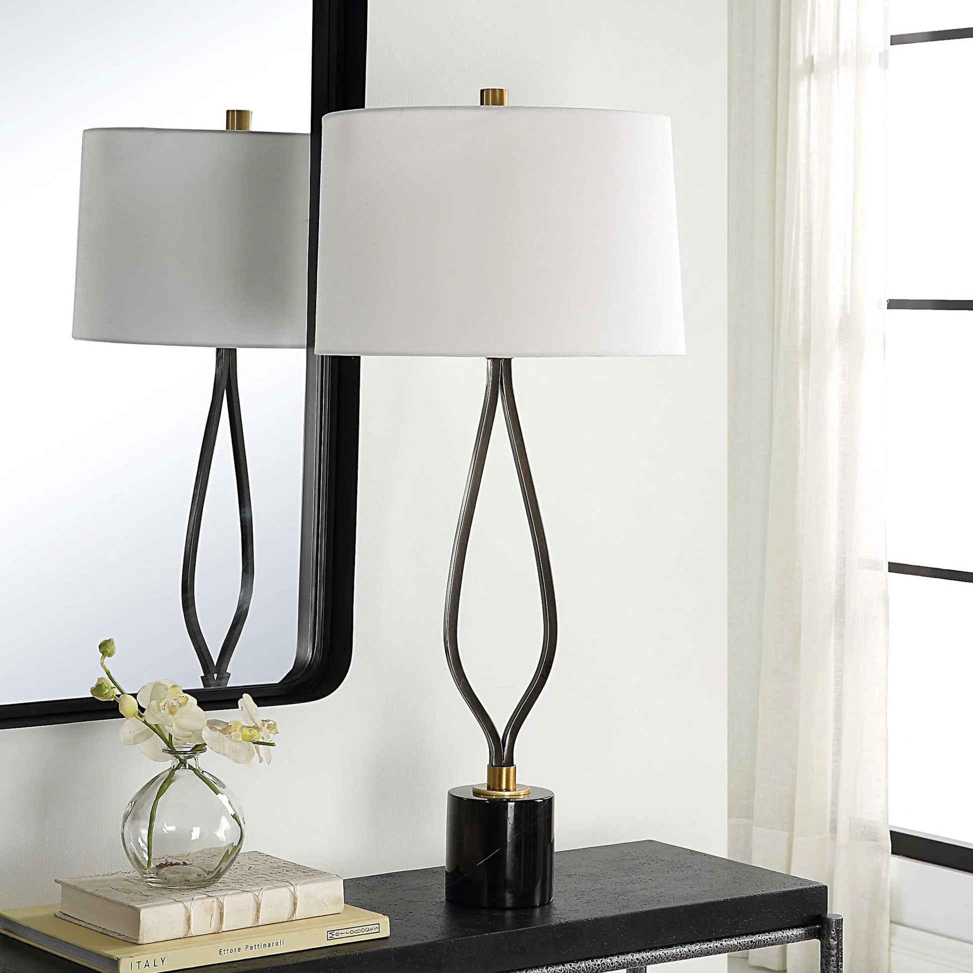 Separate Paths Table Lamp by Uttermost in black, antique brass. Made from steel, marble, fabric in a modern style.