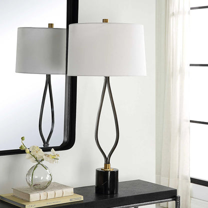 Separate Paths Table Lamp by Uttermost in black, antique brass. Made from steel, marble, fabric in a modern style.