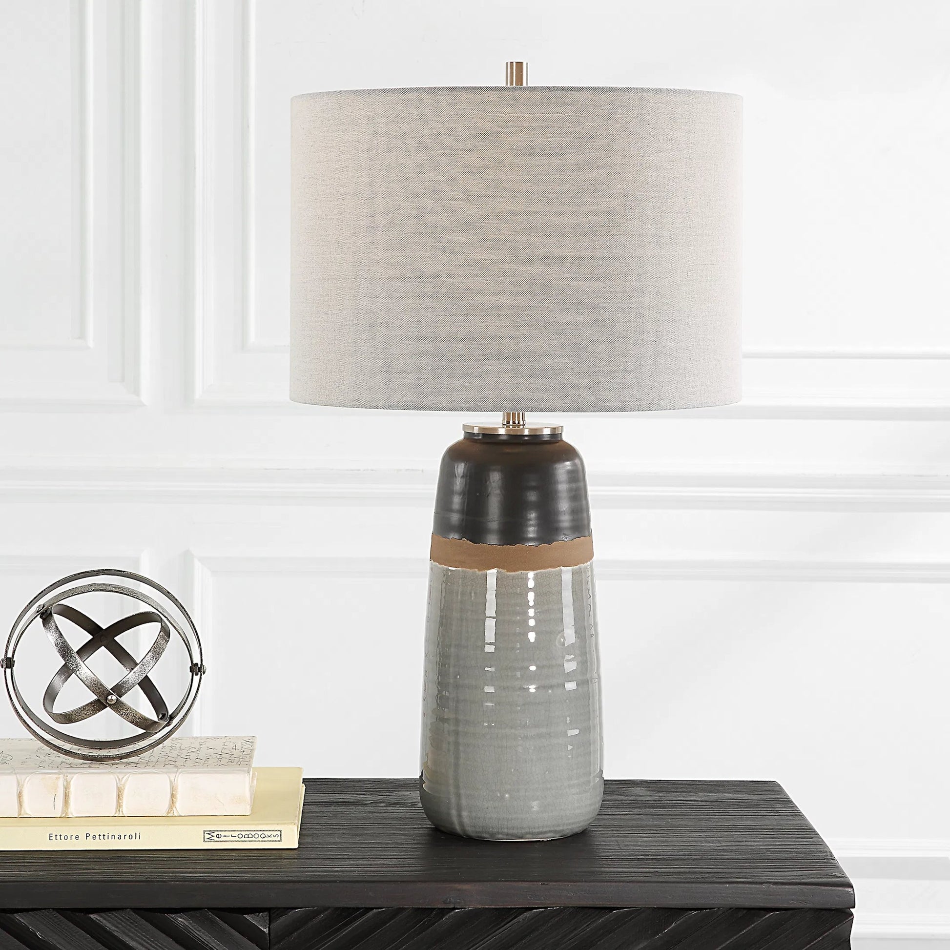 Coen Table Lamp by Uttermost in nickel. Made from steel, ceramic, fabric in a modern style.