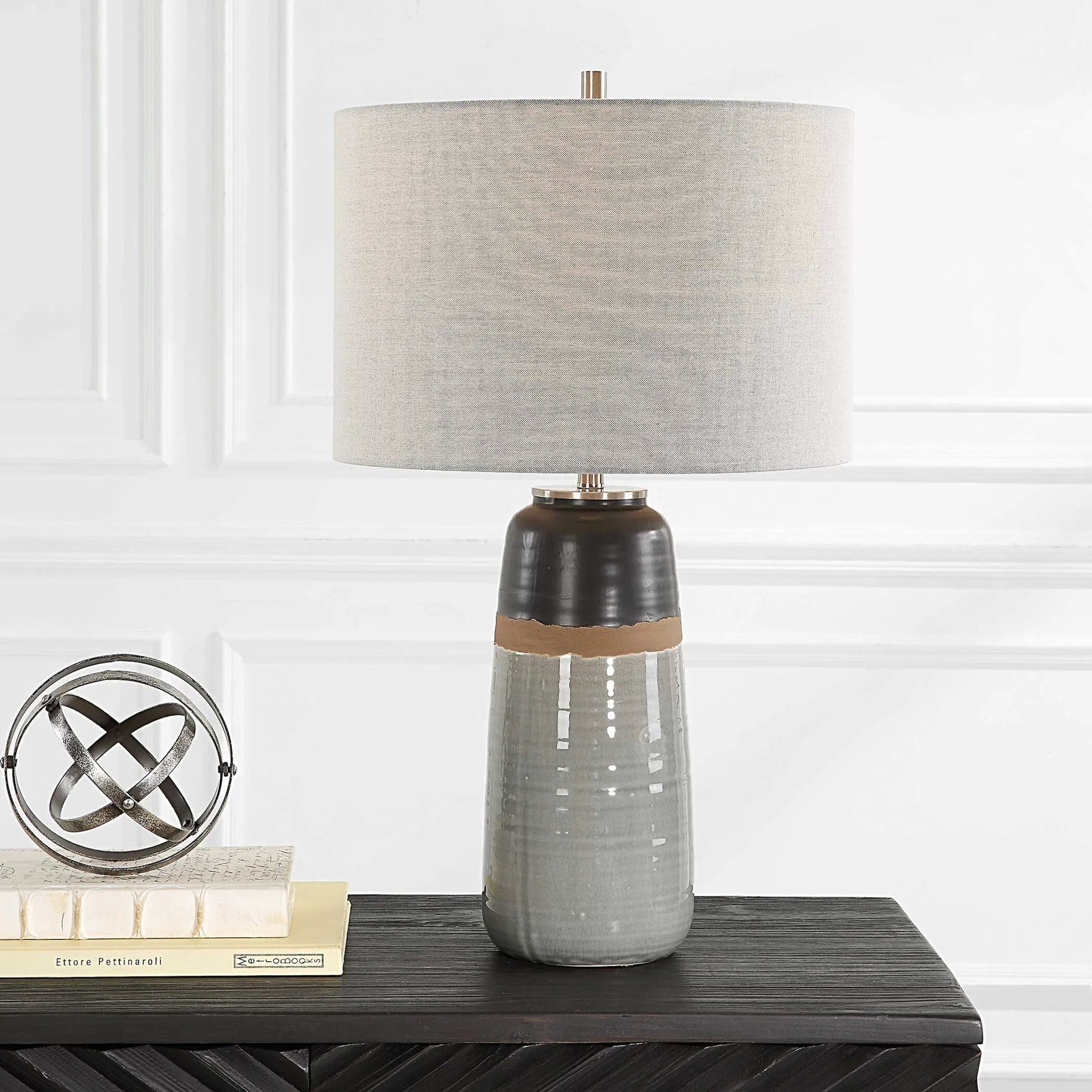 Coen Table Lamp by Uttermost in nickel. Made from steel, ceramic, fabric in a modern style.