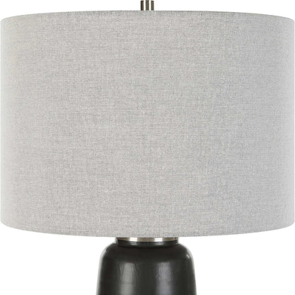 Coen Table Lamp by Uttermost in nickel. Made from steel, ceramic, fabric in a modern style.