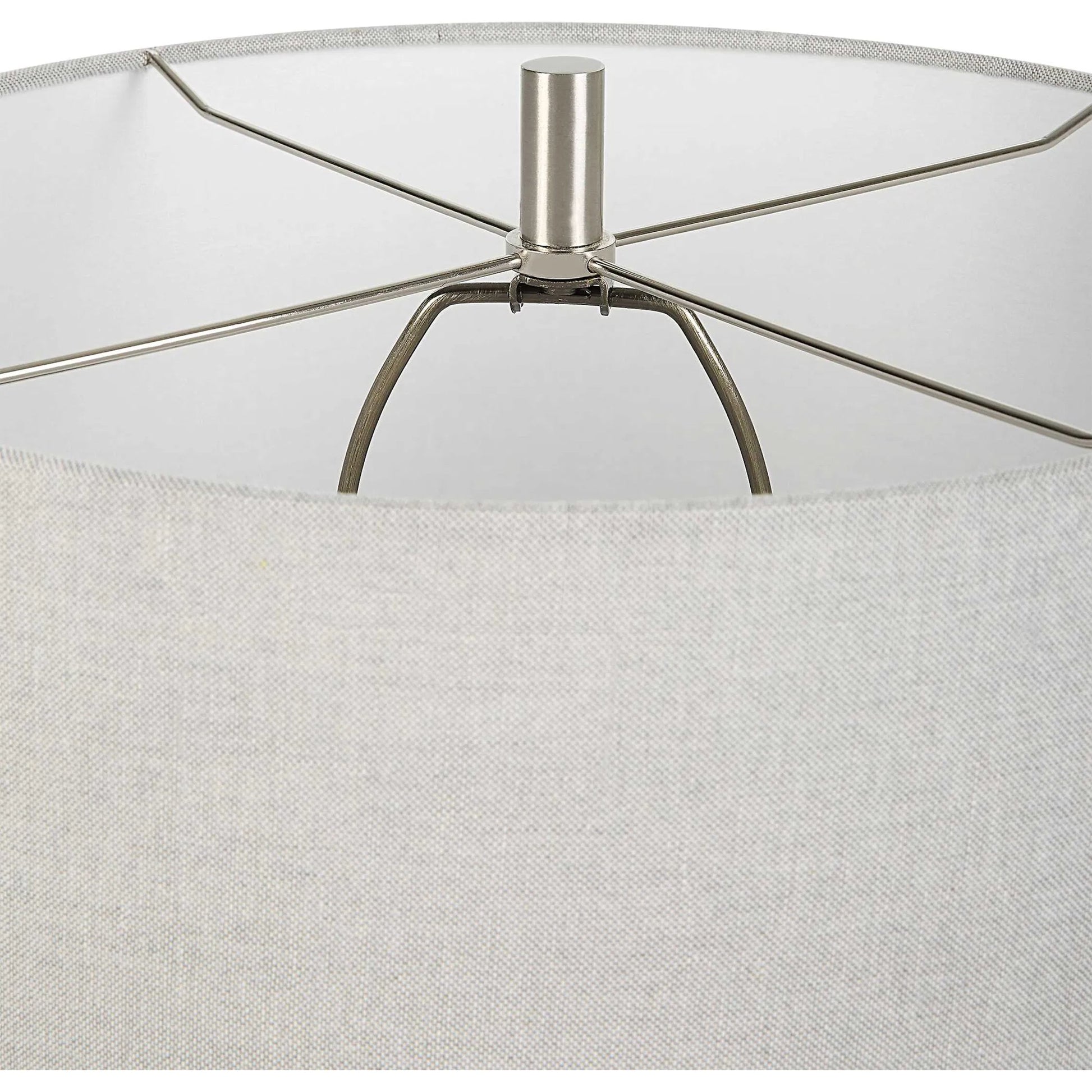 Coen Table Lamp by Uttermost in nickel. Made from steel, ceramic, fabric in a modern style.