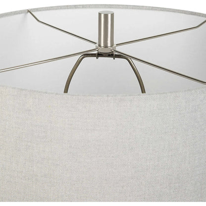 Coen Table Lamp by Uttermost in nickel. Made from steel, ceramic, fabric in a modern style.