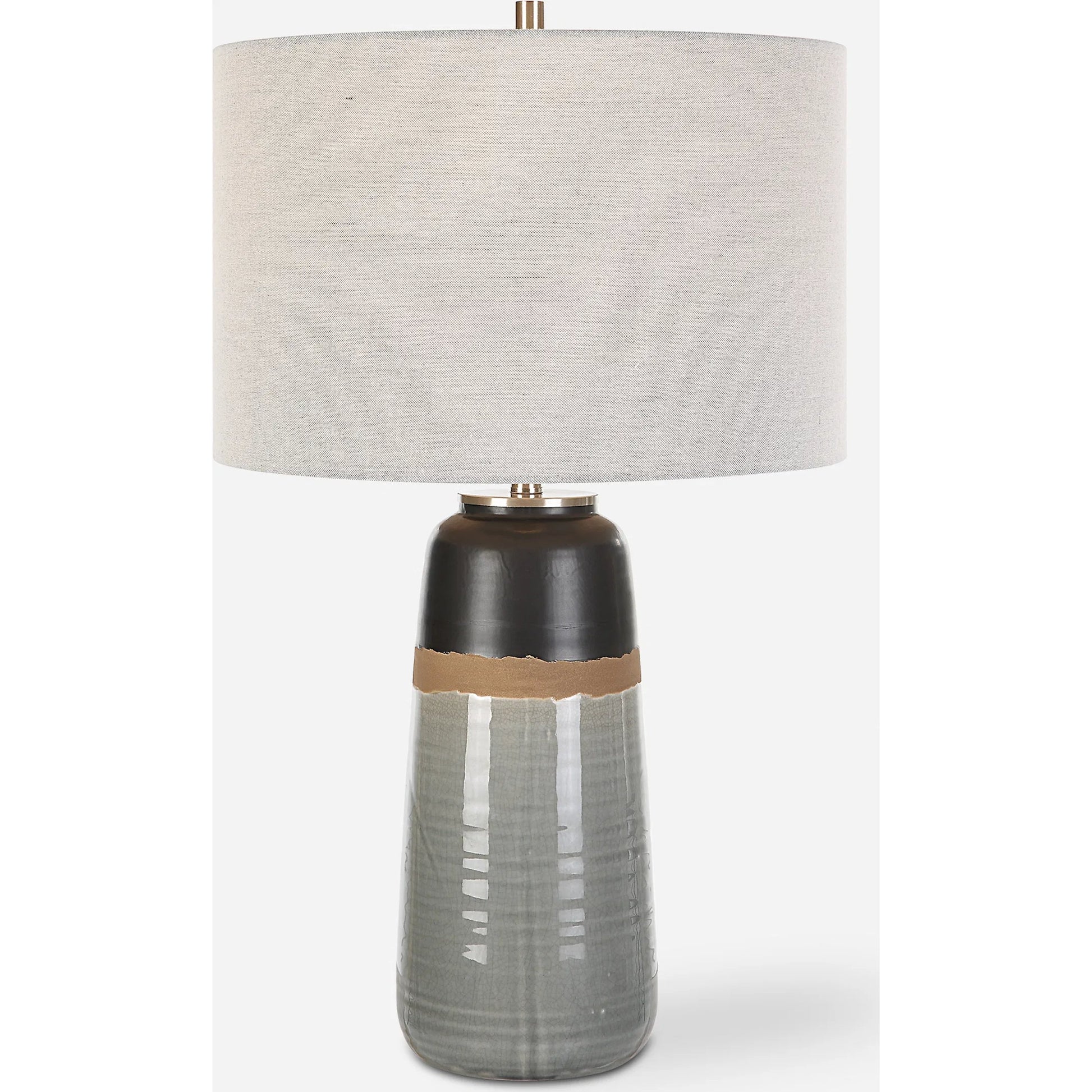 Coen Table Lamp by Uttermost in nickel. Made from steel, ceramic, fabric in a modern style.
