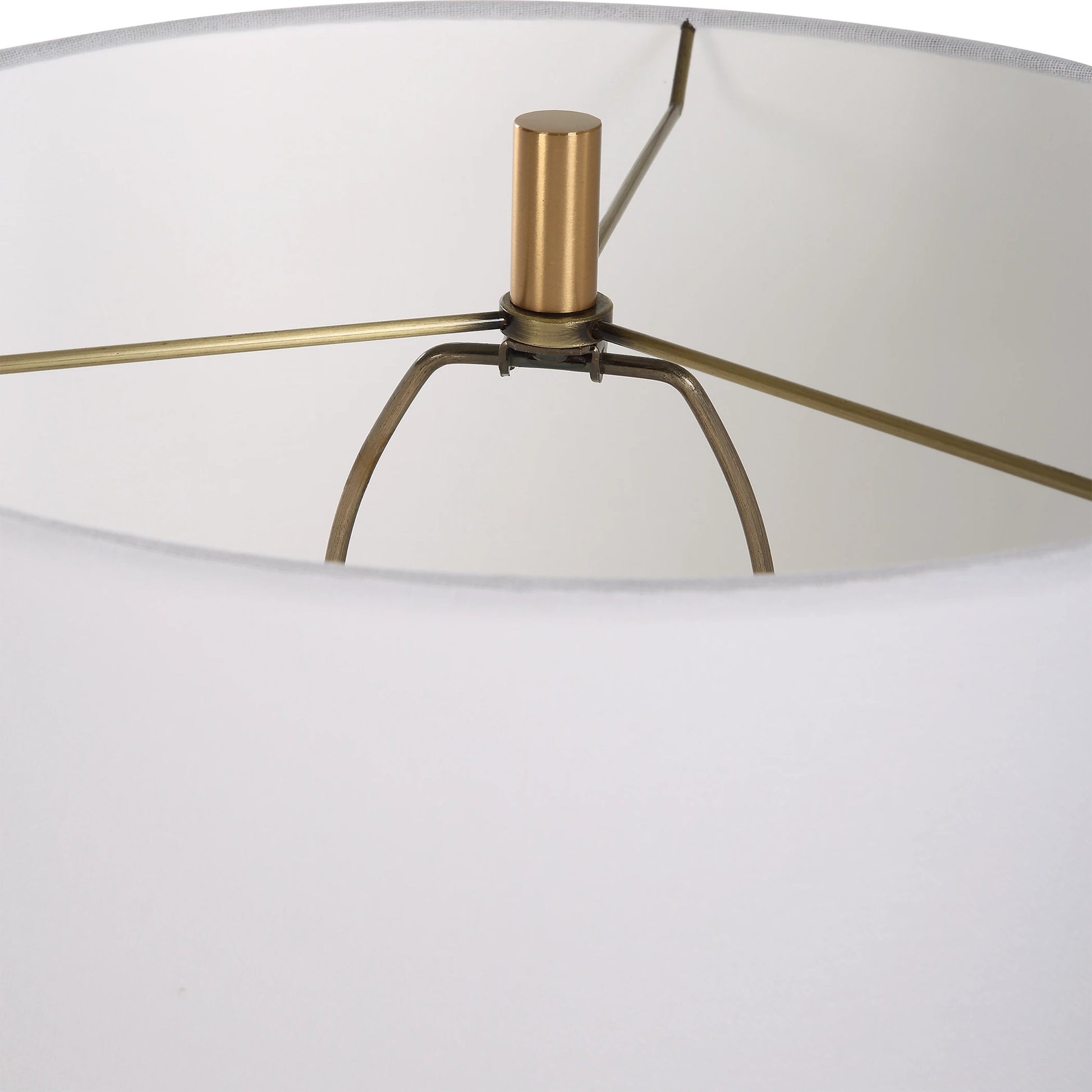 Palu Travertine Table Lamp by Uttermost in brass. Made from iron, travertine, linen in a modern style.