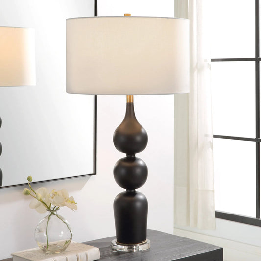 Caviar Table Lamp by Uttermost in brass. Made from ceramic, crystal, iron, fabric in a unique style.