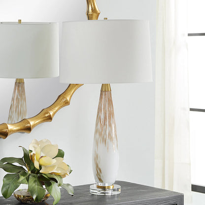 Lyra & Table Lamp by Uttermost in gold. Made from crystal, glass, iron, fabric in a transitional style.